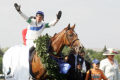 Schiaparelli und Andrasch Starke als Derbysieger. www.galoppfoto.de